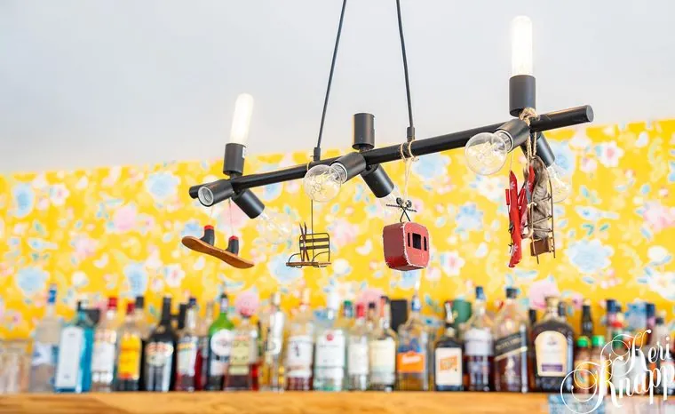 Bar lighting fixture over the bottle shelf